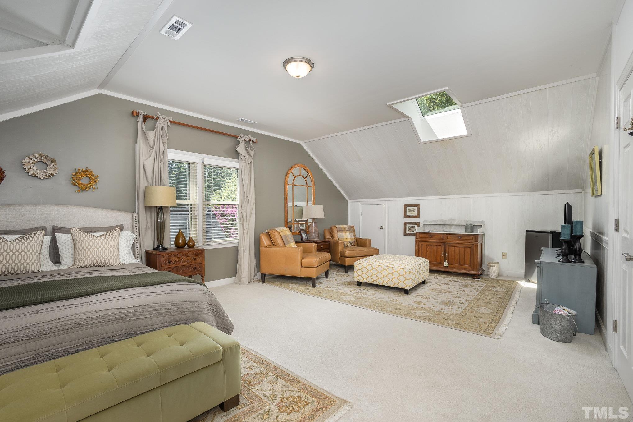 7941 Footman Way Raleigh, NC 27615 - Photo 30 of 41 a bedroom with bed and furniture