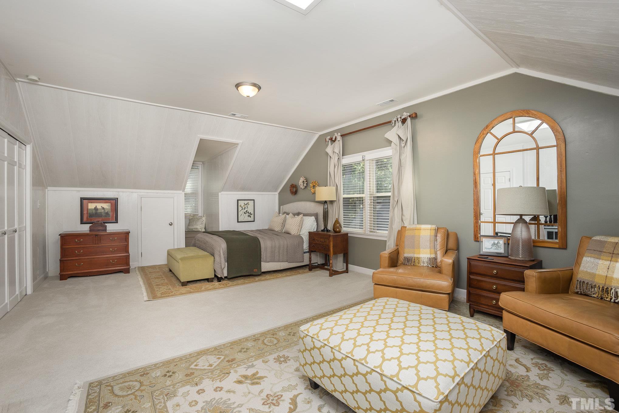 7941 Footman Way Raleigh, NC 27615 - Photo 31 of 41 a bedroom with furniture and a large window