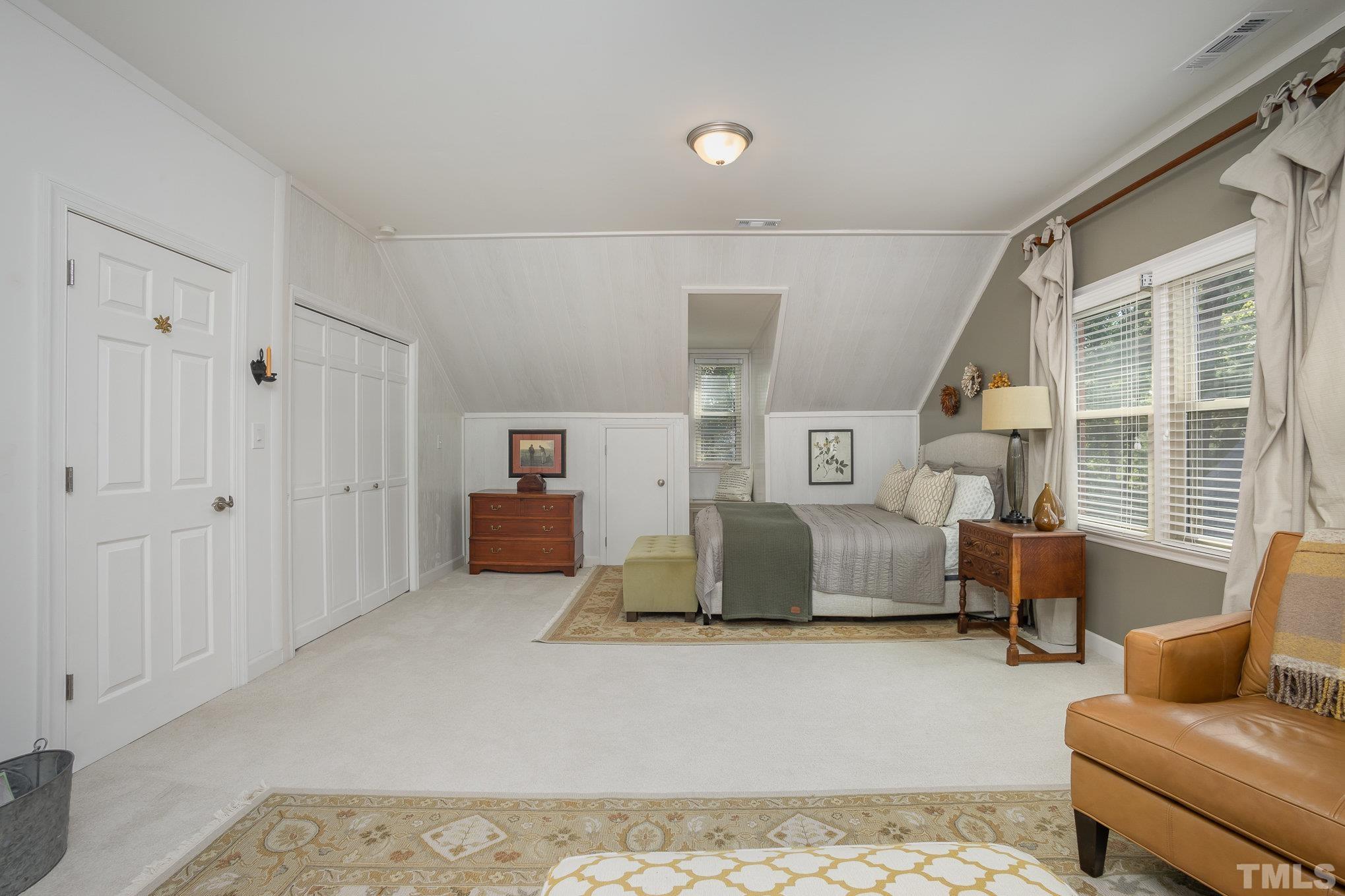 7941 Footman Way Raleigh, NC 27615 - Photo 32 of 41 a living room with furniture and a flat screen tv