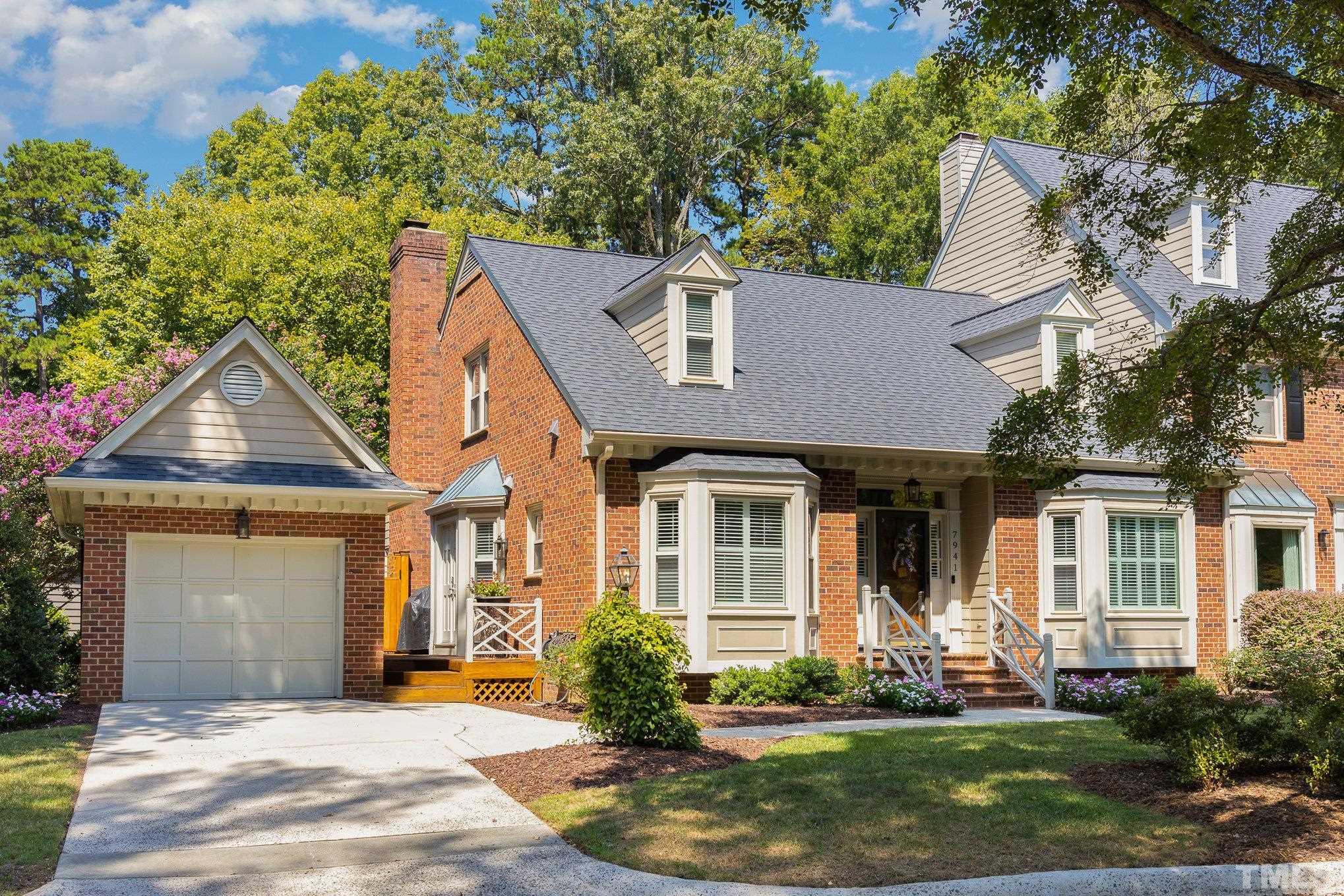 7941 Footman Way Raleigh, NC 27615 - Photo 4 of 41 front view of a house with a yard