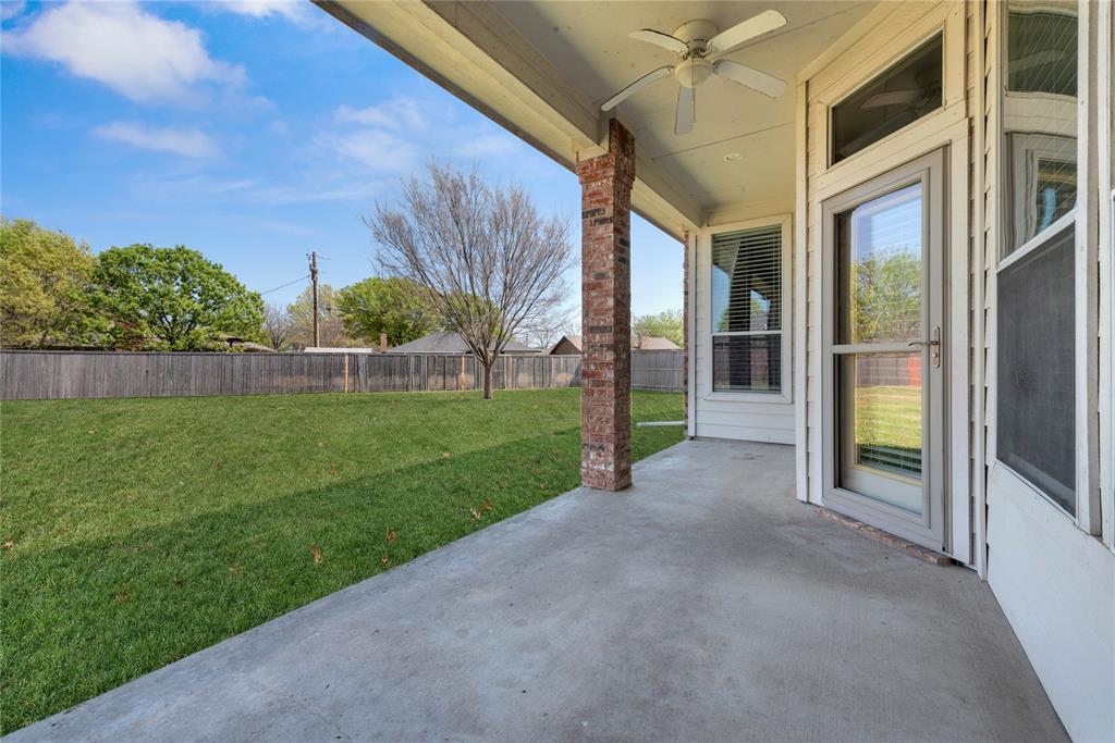 910 Derby Court Celina, TX 75009 - Photo 24 of 27 a view of a house with backyard and porch