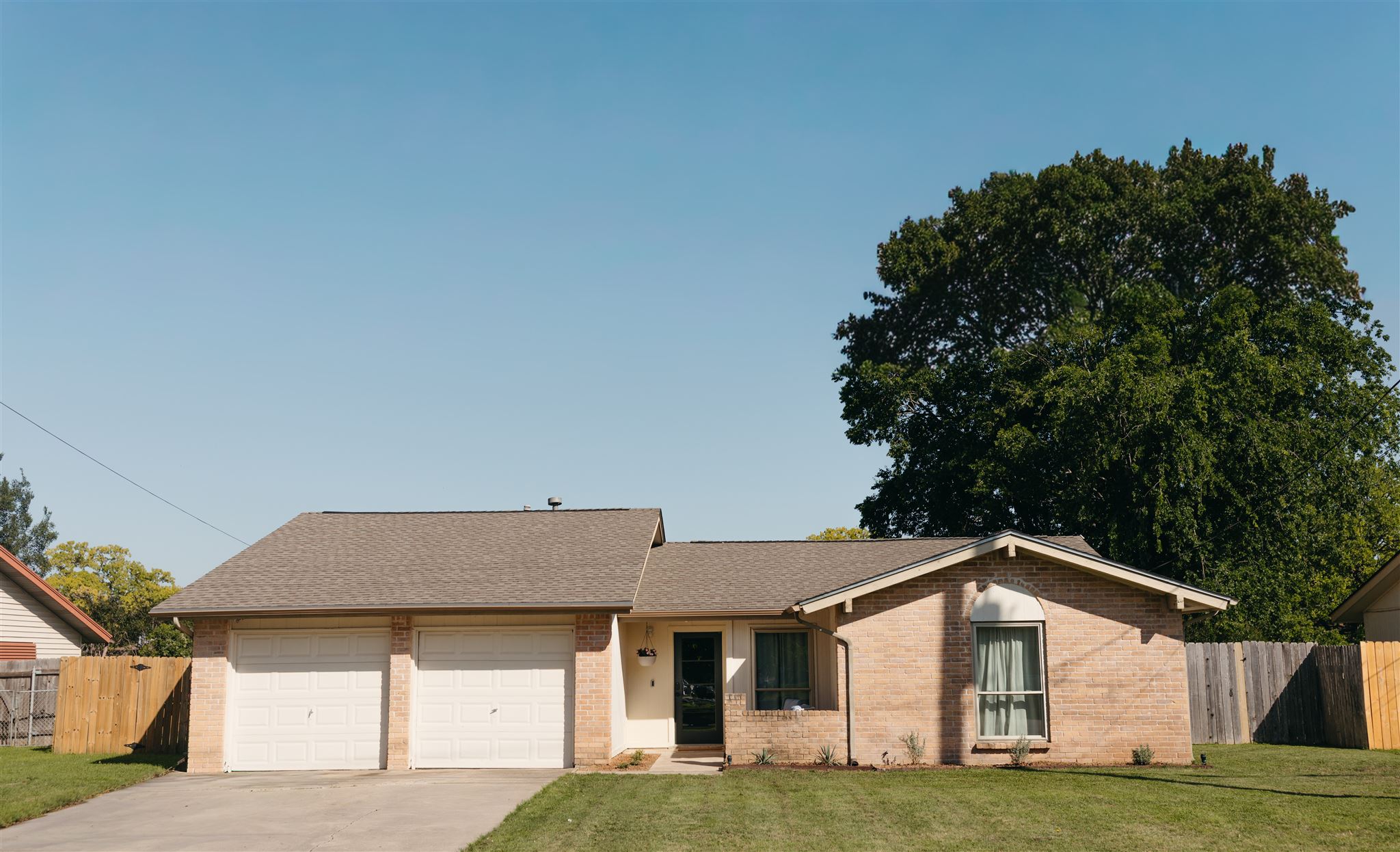 506 Central Drive Georgetown, TX 78628 - Photo 2 of 29 a front view of a house with a yard