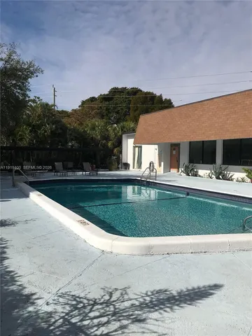a view of outdoor space yard and swimming pool