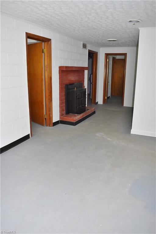 1464 Fancy Gap Road Mount Airy, NC 27030 - Photo 23 of 27 Basement w/ Fireplace