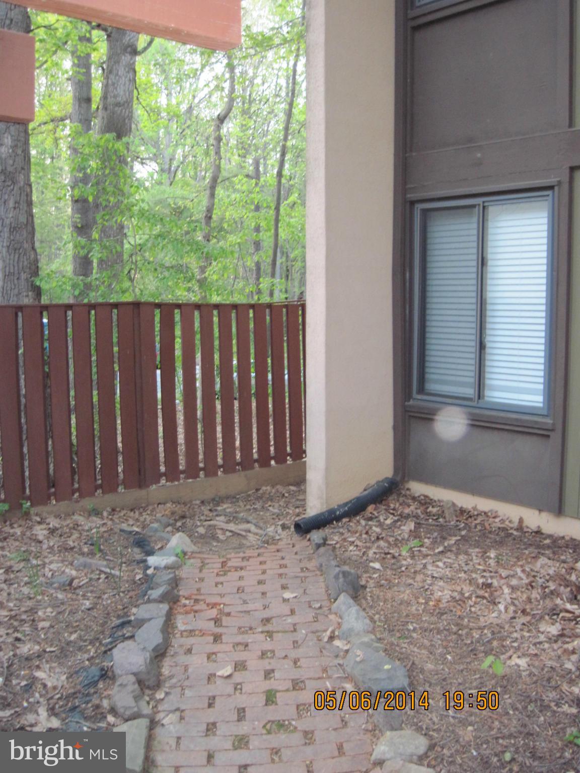 2242 Southgate Square Reston, VA 20191 - Photo 3 of 26 Front yard inside fence looking left