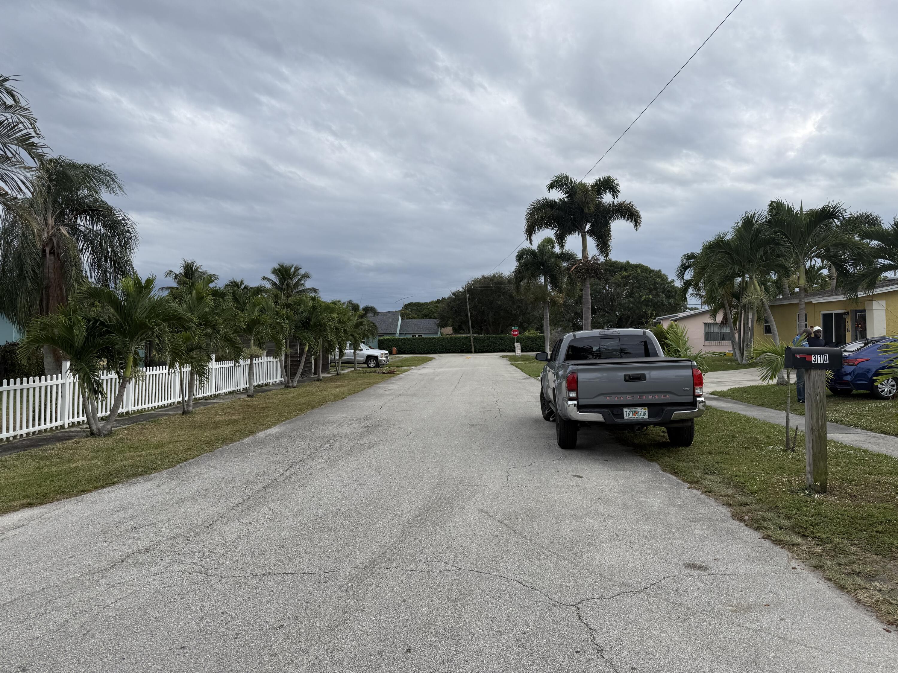 310 Washington Avenue Delray Beach, FL 33444 - Photo 16 of 16 a view of street with parked cars