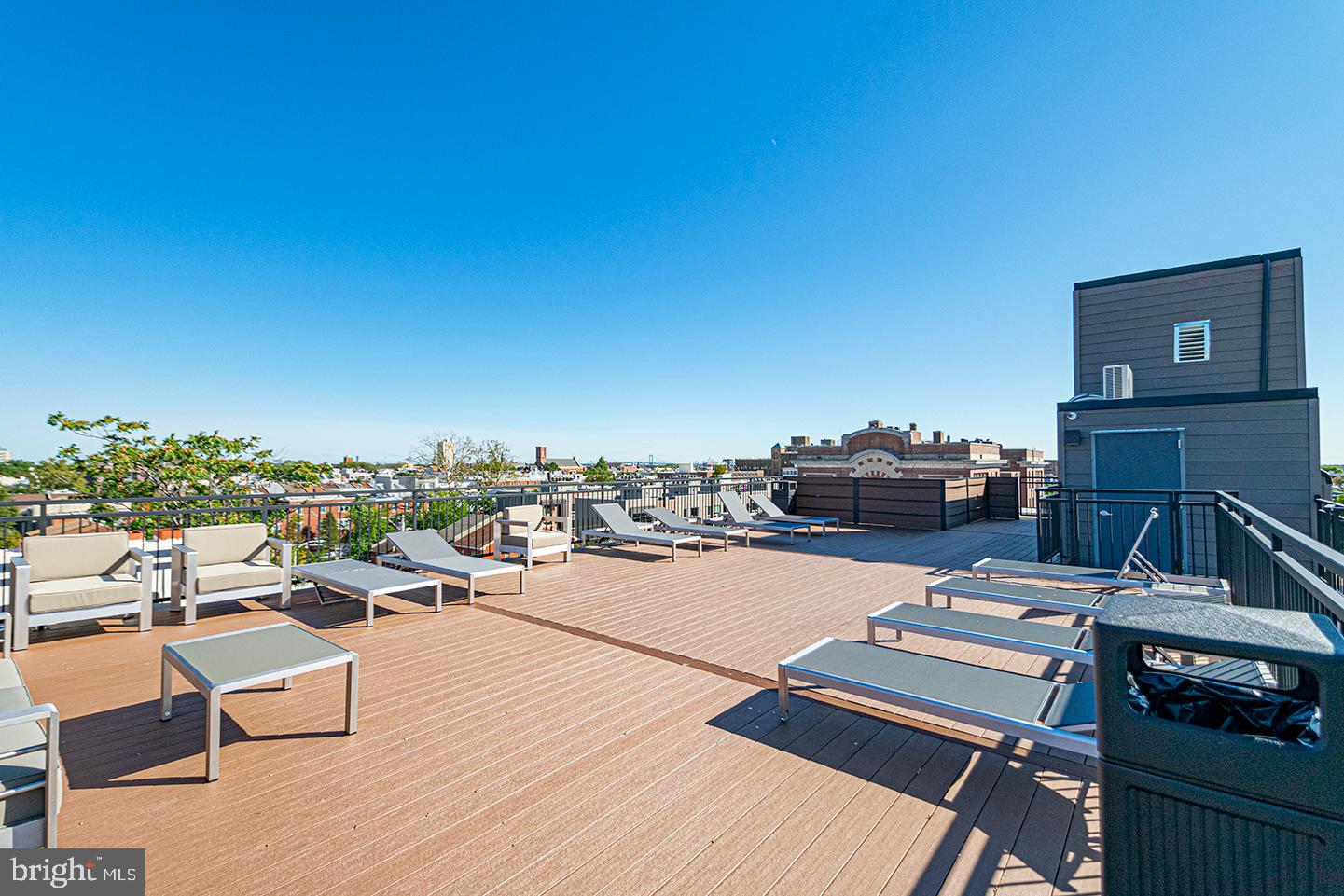 1211 Bainbridge Street, Unit 4C Philadelphia, PA 19147 - Photo 18 of 19 a terrace with outdoor seating and trees