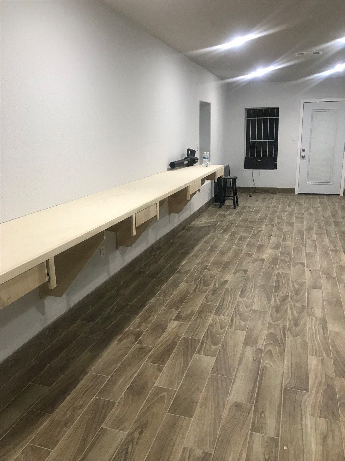 7424 Lindencrest Street Houston, TX 77061 - Photo 4 of 6 a spacious bathroom with a sink and a mirror