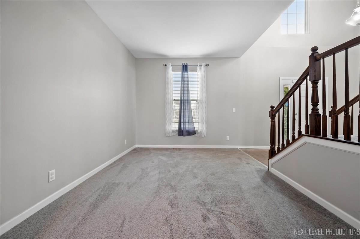 442 Windett Ridge Road Yorkville, IL 60560 - Photo 13 of 43 en empty room with windows