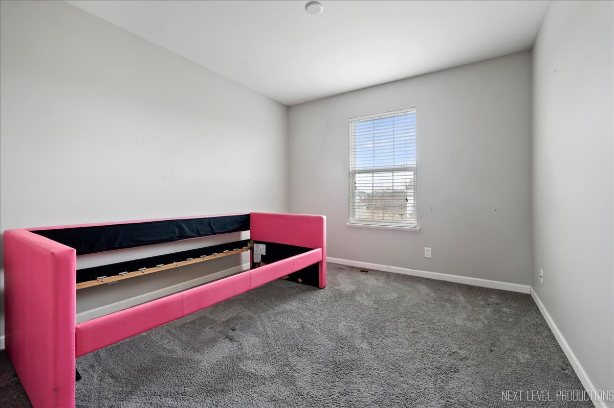 442 Windett Ridge Road Yorkville, IL 60560 - Photo 30 of 43 a room with furniture pool table and windows