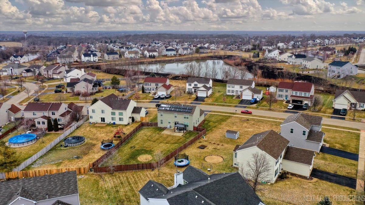 442 Windett Ridge Road Yorkville, IL 60560 - Photo 35 of 43 an aerial view of residential houses with outdoor space