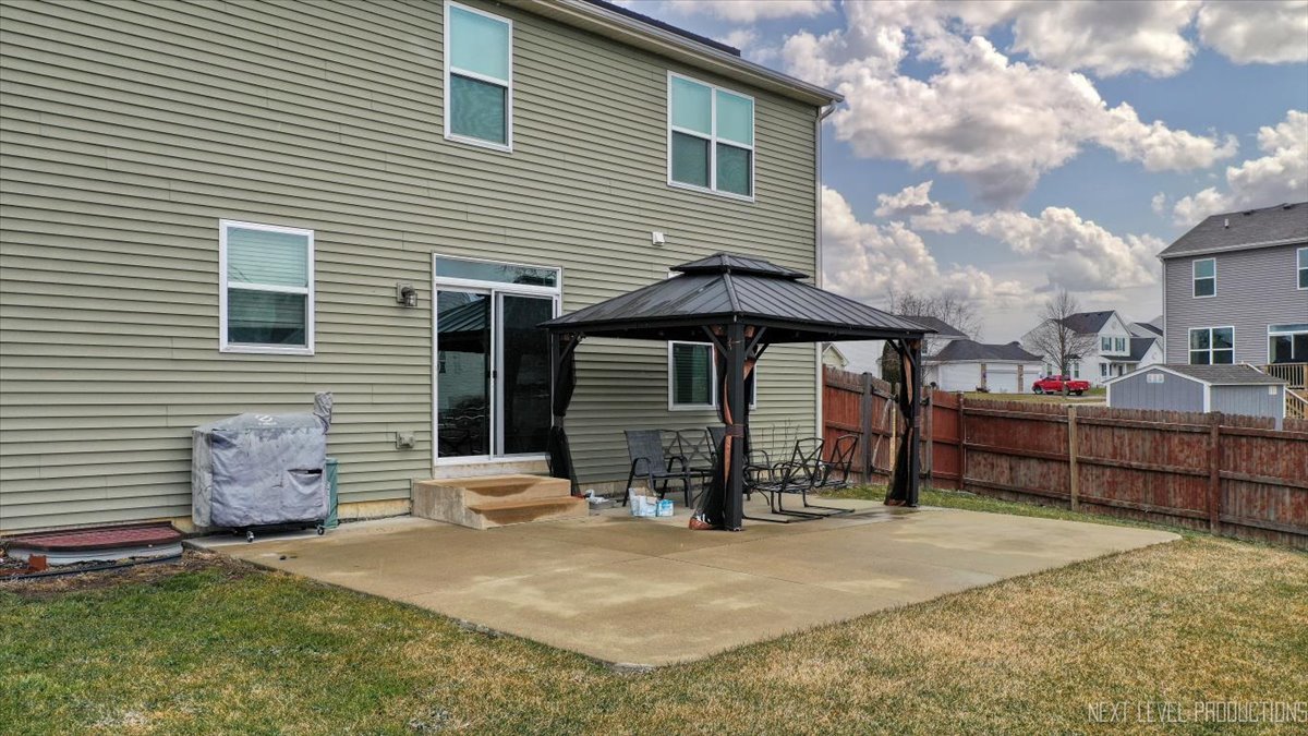 442 Windett Ridge Road Yorkville, IL 60560 - Photo 38 of 43 a view of a house with backyard