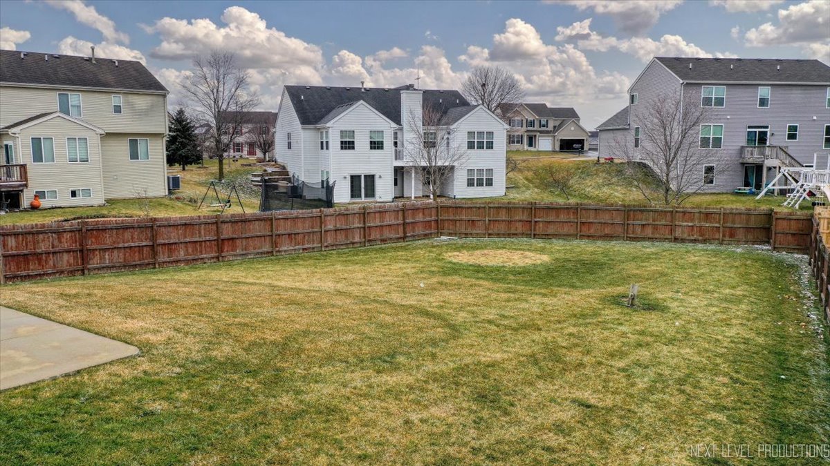 442 Windett Ridge Road Yorkville, IL 60560 - Photo 39 of 43 a view of a house with a swimming pool