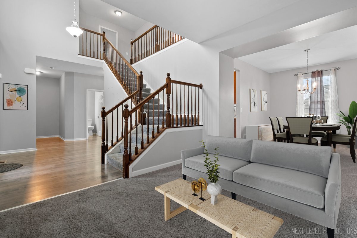 442 Windett Ridge Road Yorkville, IL 60560 - Photo 10 of 43 a living room with furniture and wooden floor