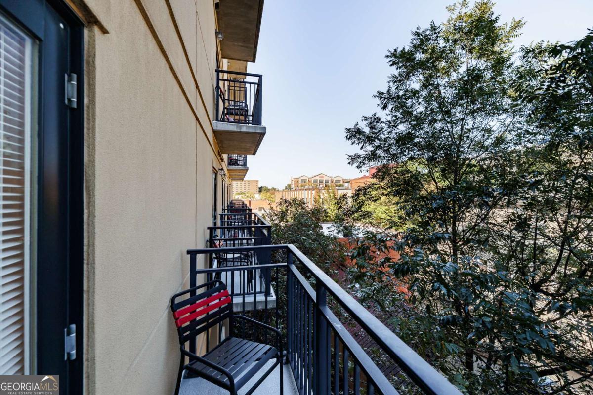 250 West Broad Street, Unit 521 Athens, GA 30601 - Photo 18 of 32 a balcony with an outdoor space