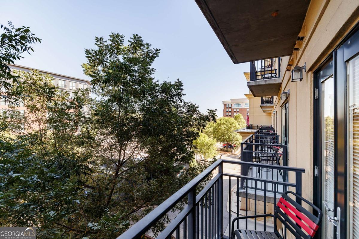 250 West Broad Street, Unit 521 Athens, GA 30601 - Photo 19 of 32 a view of balcony with wooden staircase