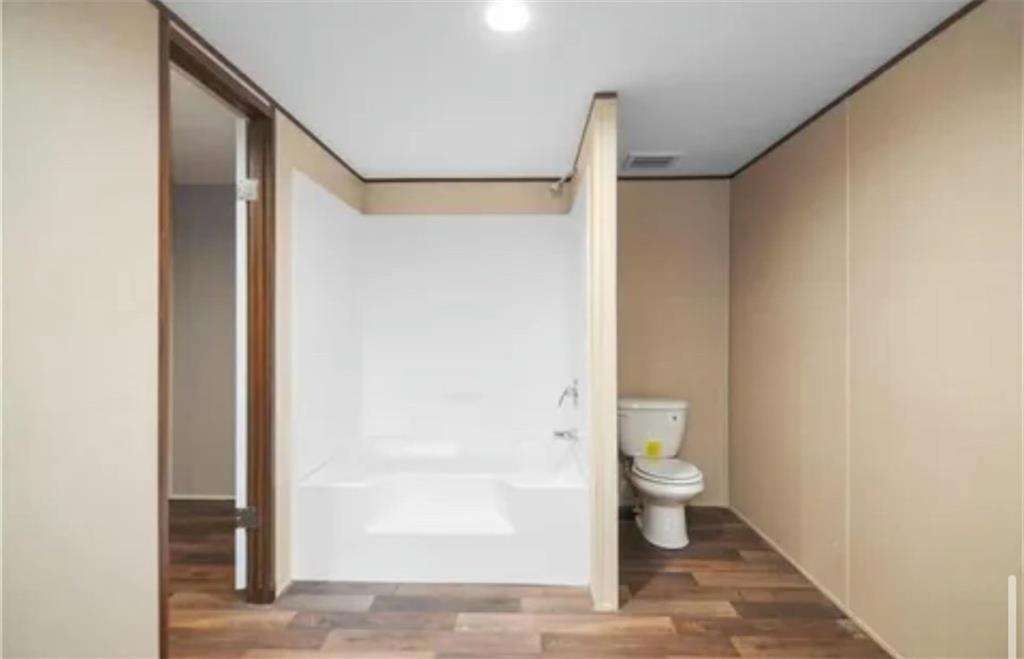 348 Ruby Ridge Drive Talking Rock, GA 30175 - Photo 13 of 17 a bathroom with a toilet and a shower