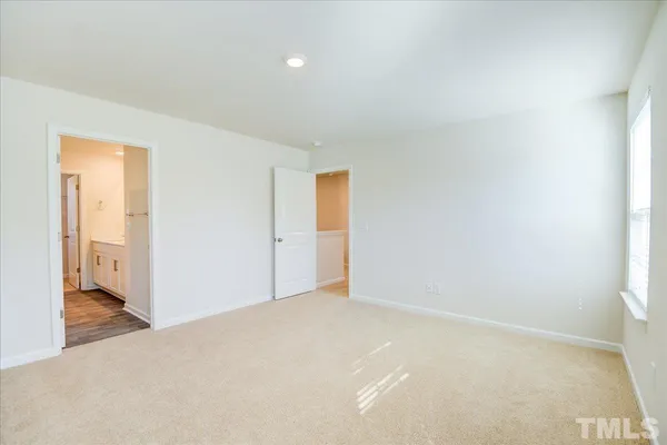 a bathroom with 2 sink and a mirror
