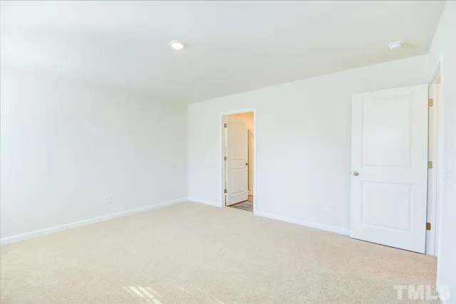 a bathroom with a double vanity sink a mirror and a