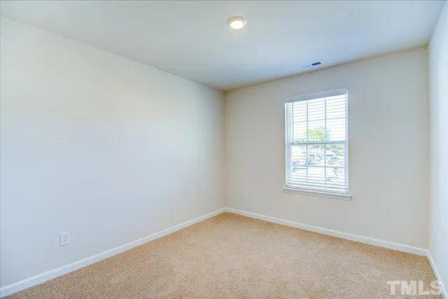 a bathroom with a sink a toilet a shower and a mirror