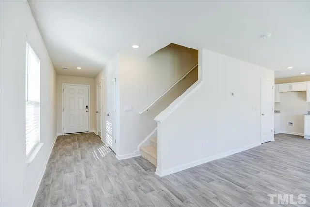 a view of hallway with closet
