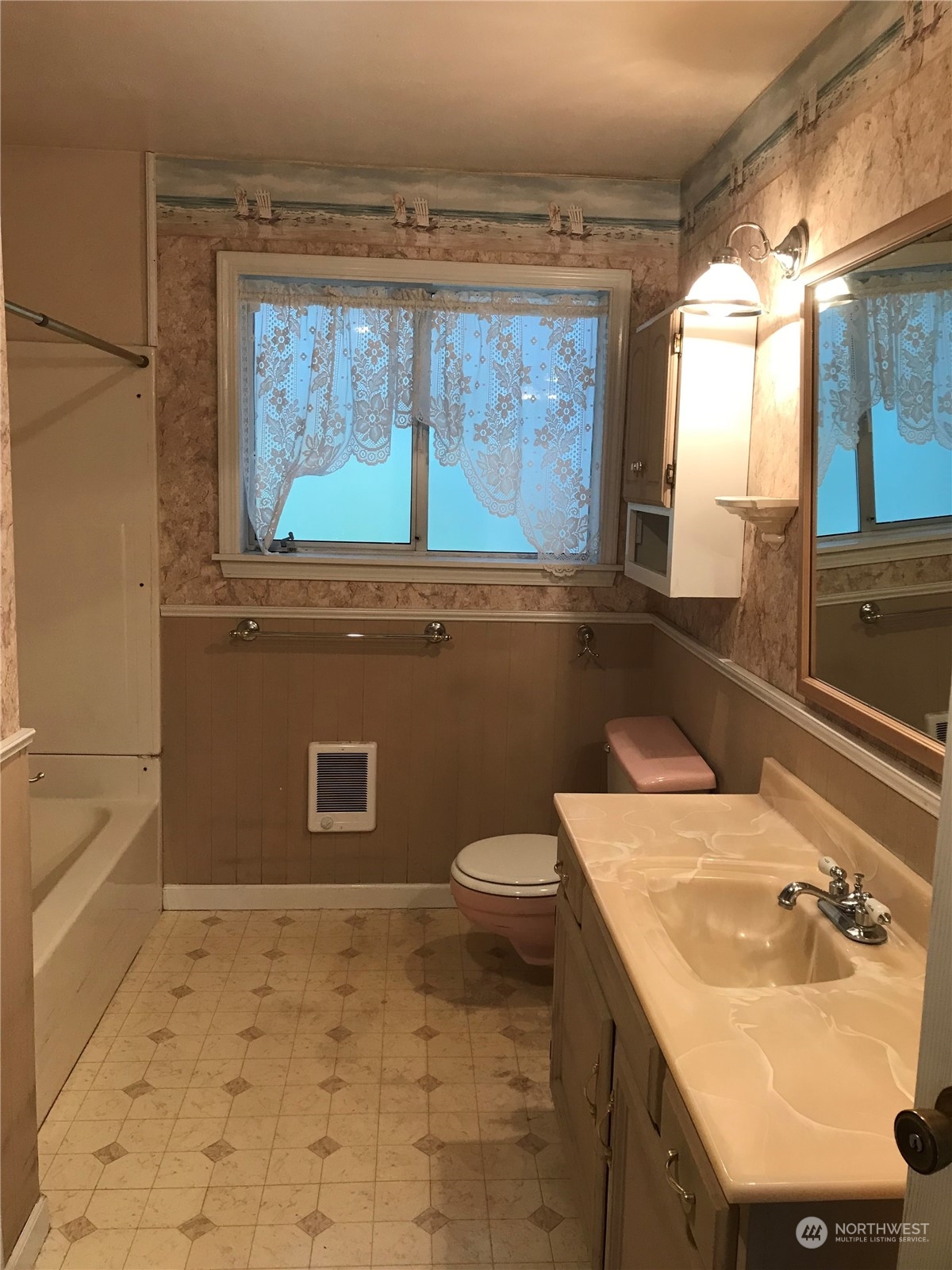22817 Jefferson Point Road Northeast Kingston, WA 98346 - Photo 11 of 24 a bathroom with a sink a toilet and a bathtub