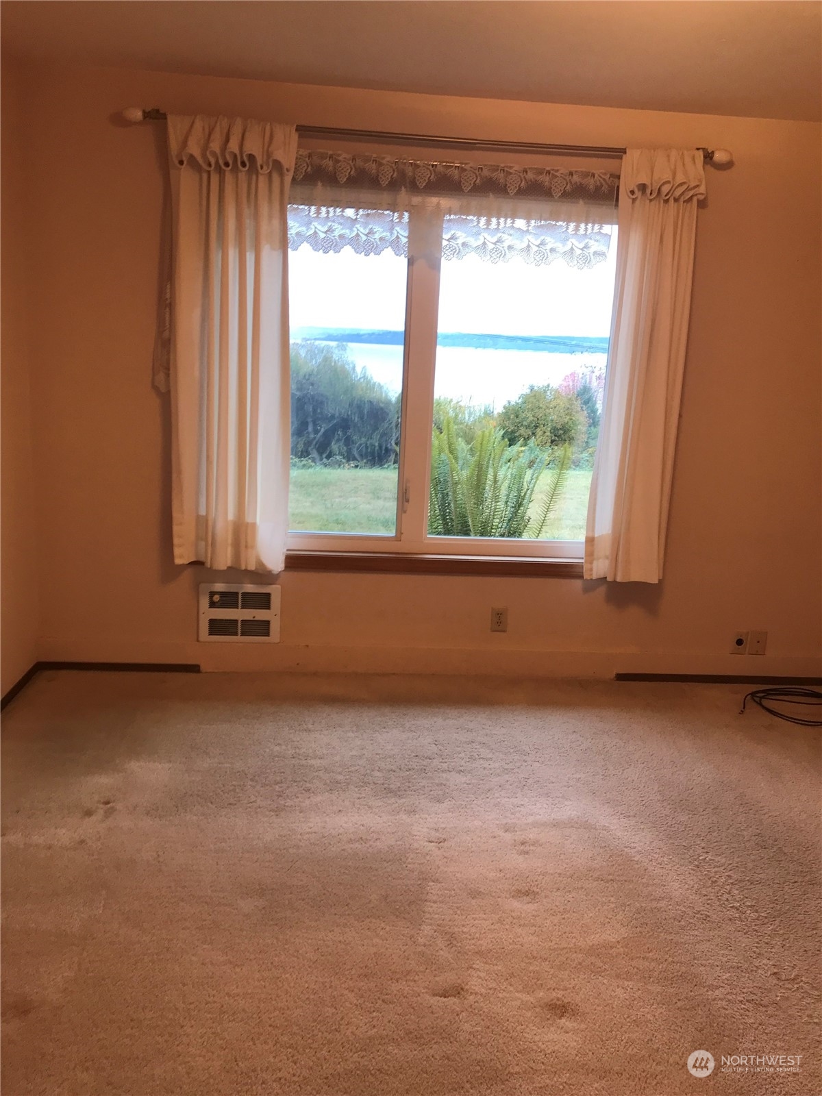 22817 Jefferson Point Road Northeast Kingston, WA 98346 - Photo 12 of 24 a view of a room with a window