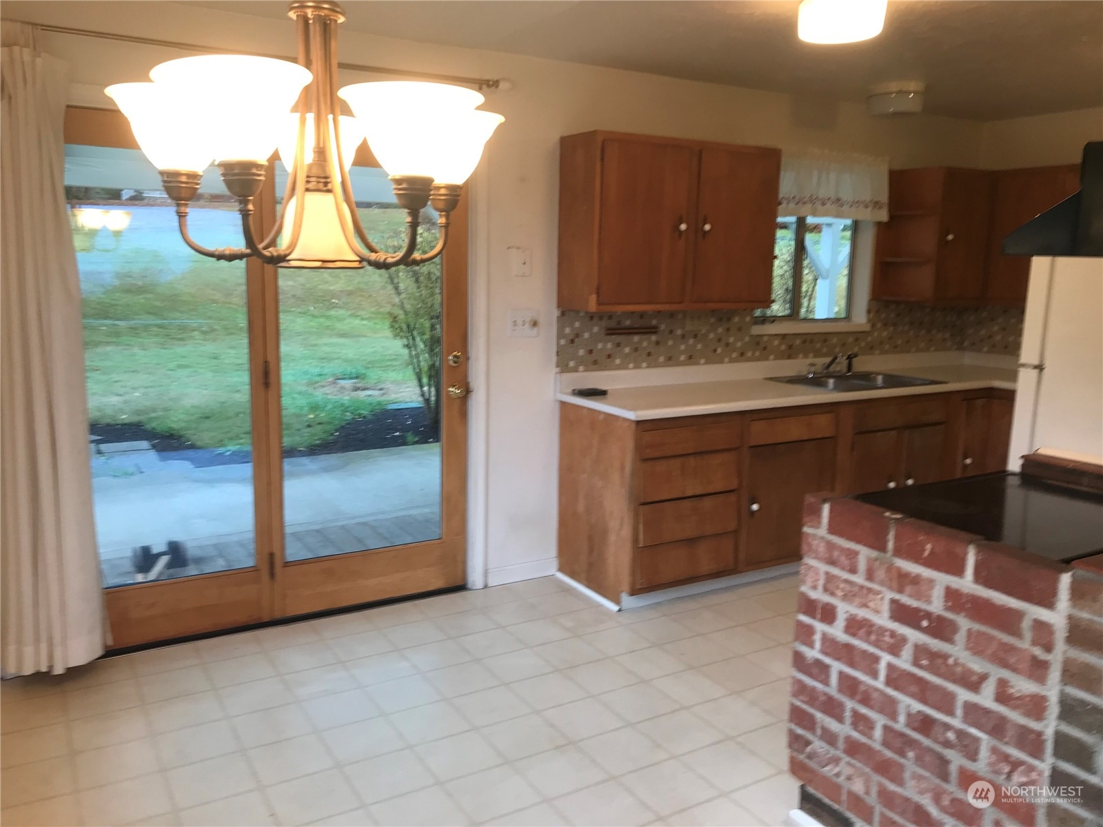 22817 Jefferson Point Road Northeast Kingston, WA 98346 - Photo 10 of 24 a bathroom with a sink and a mirror