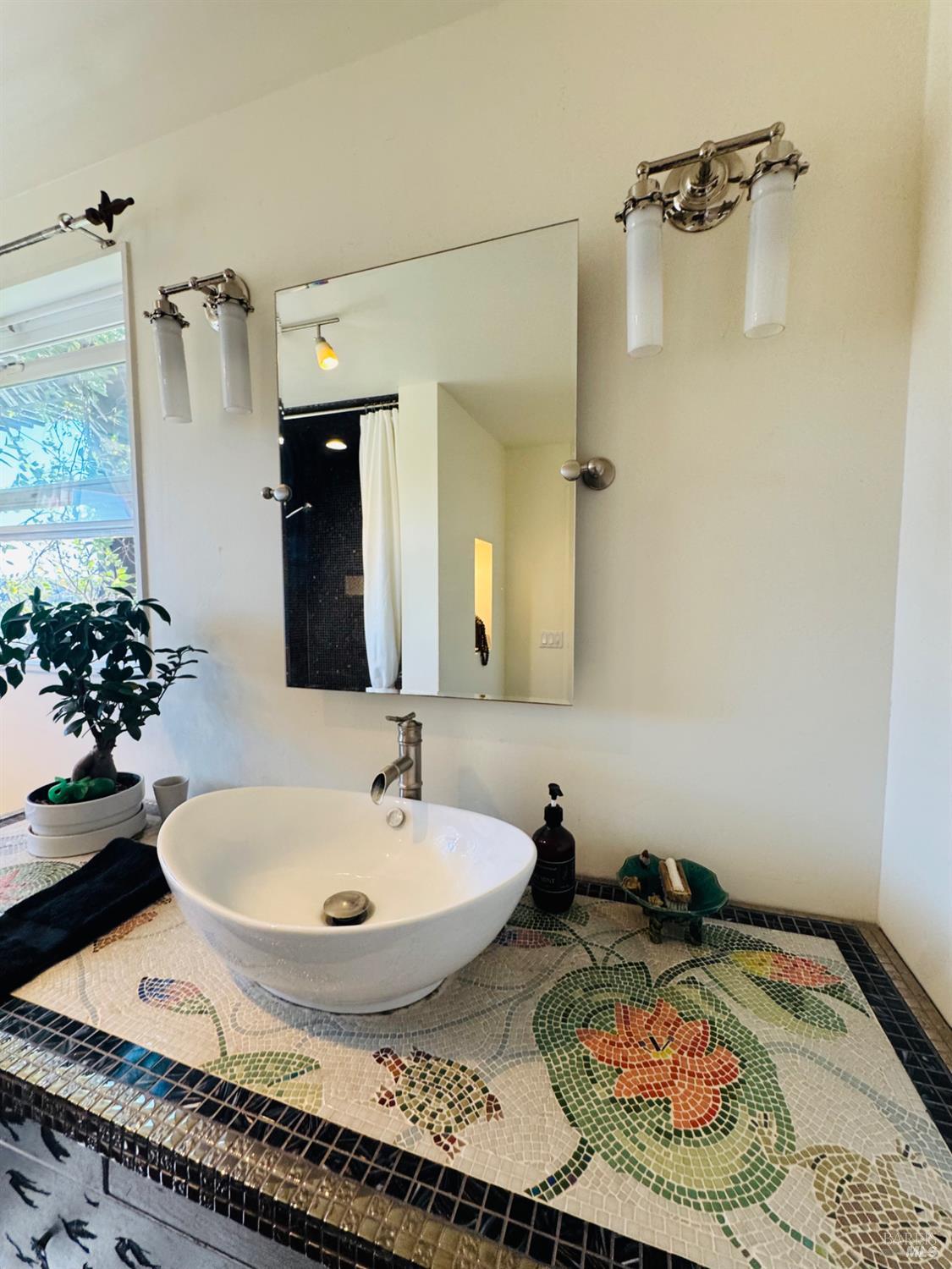 18574 Tomki Road Willits, CA 95490 - Photo 12 of 25 a bathroom with a sink and a mirror