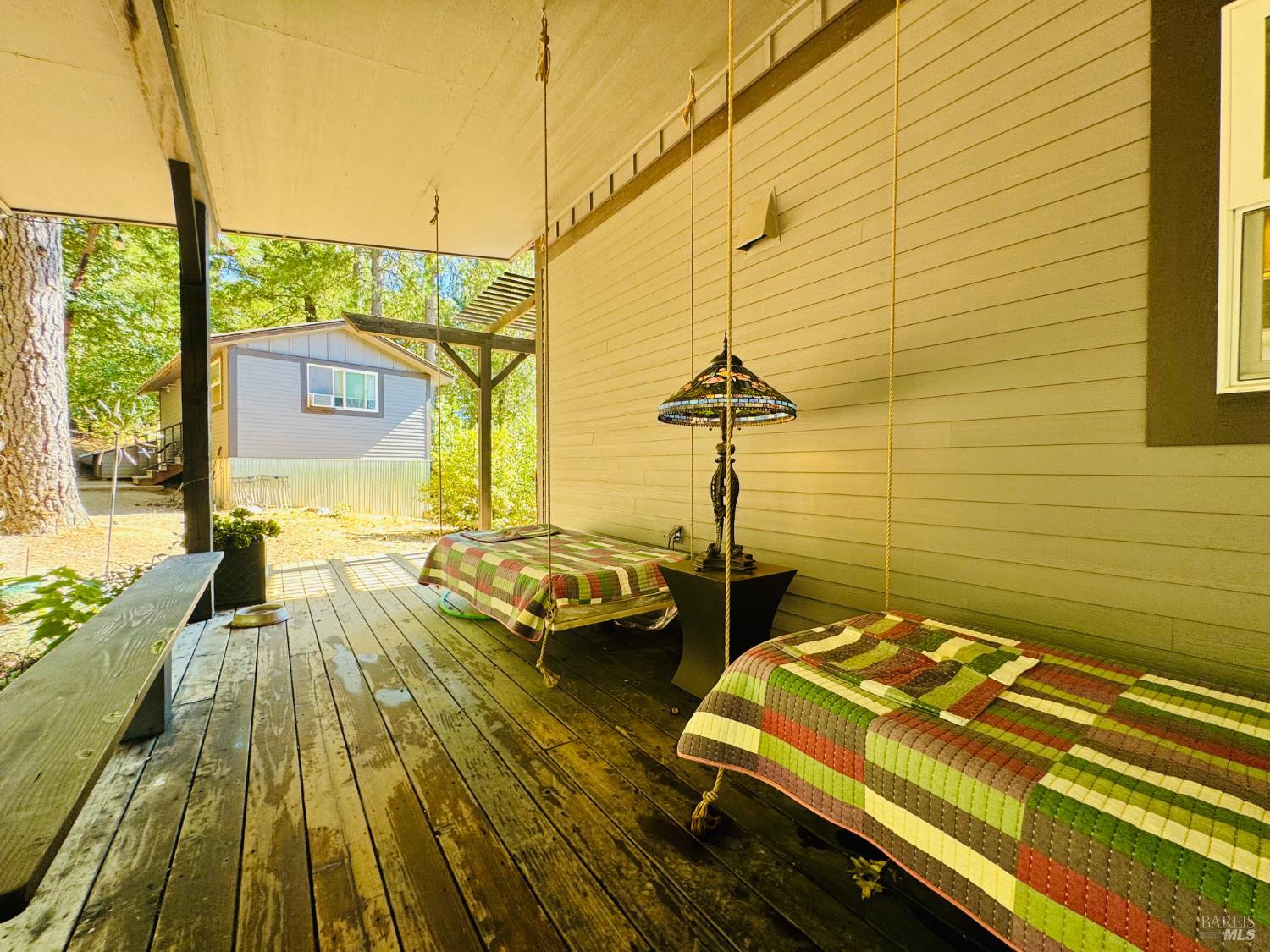 18574 Tomki Road Willits, CA 95490 - Photo 17 of 25 a front view of a house with a outdoor space