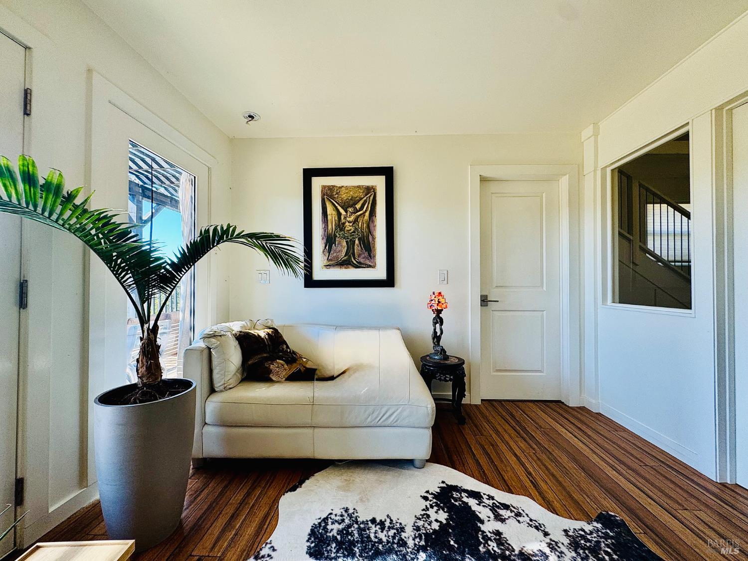 18574 Tomki Road Willits, CA 95490 - Photo 6 of 25 a bedroom with a bed and a painting on the wall