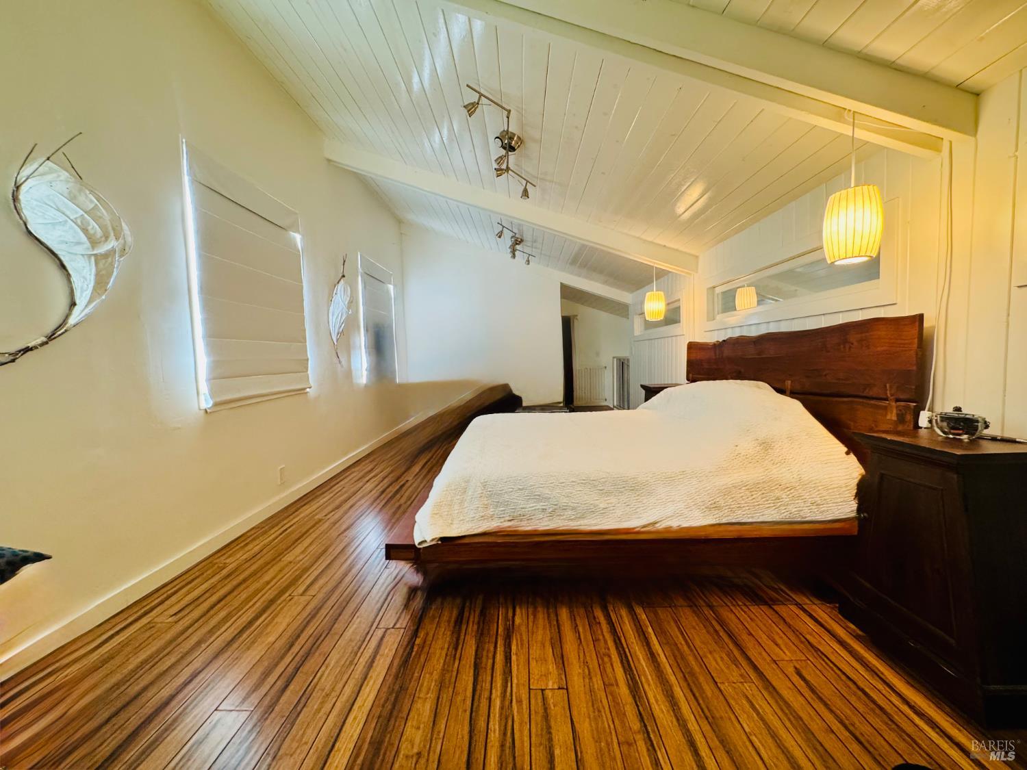 18574 Tomki Road Willits, CA 95490 - Photo 10 of 25 a bed sitting in a bedroom next to a window