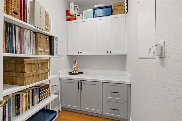 a utility room with cabinets