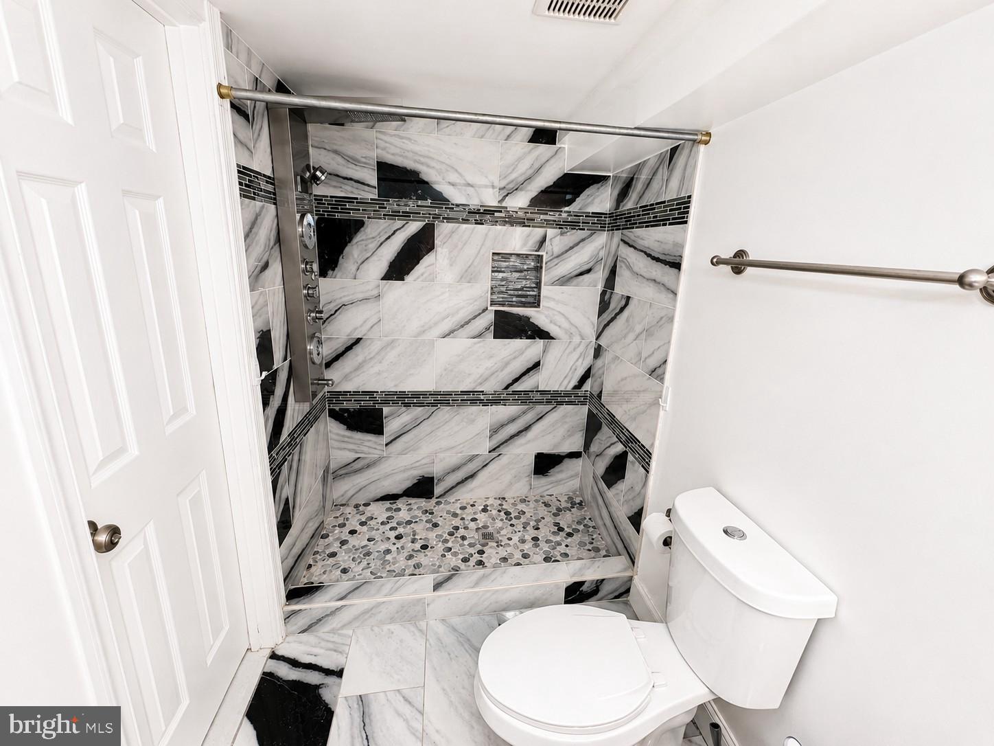 1610 Federal Street Baltimore, MD 21213 - Photo 24 of 27 Elegant marble shower retreat.