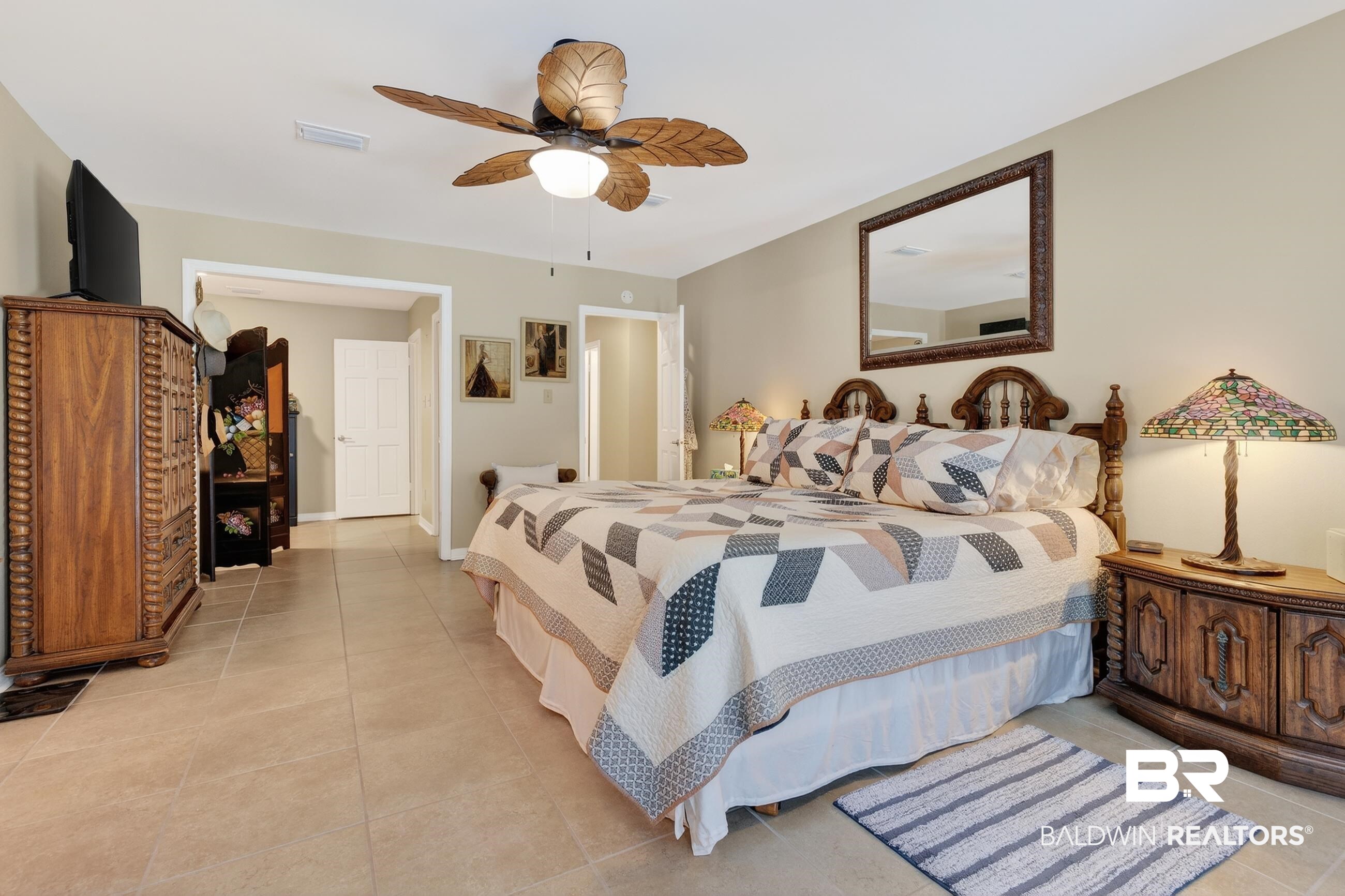 1271 Spring Valley Drive South Mobile, AL 36693 - Photo 33 of 56 Bedroom featuring light tile patterned floors and a ceiling fan