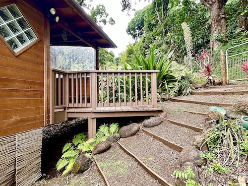 4867 Wainiha Powerhouse Road Hanalei, HI 96714 - Photo 20 of 26 a balcony with wooden floor
