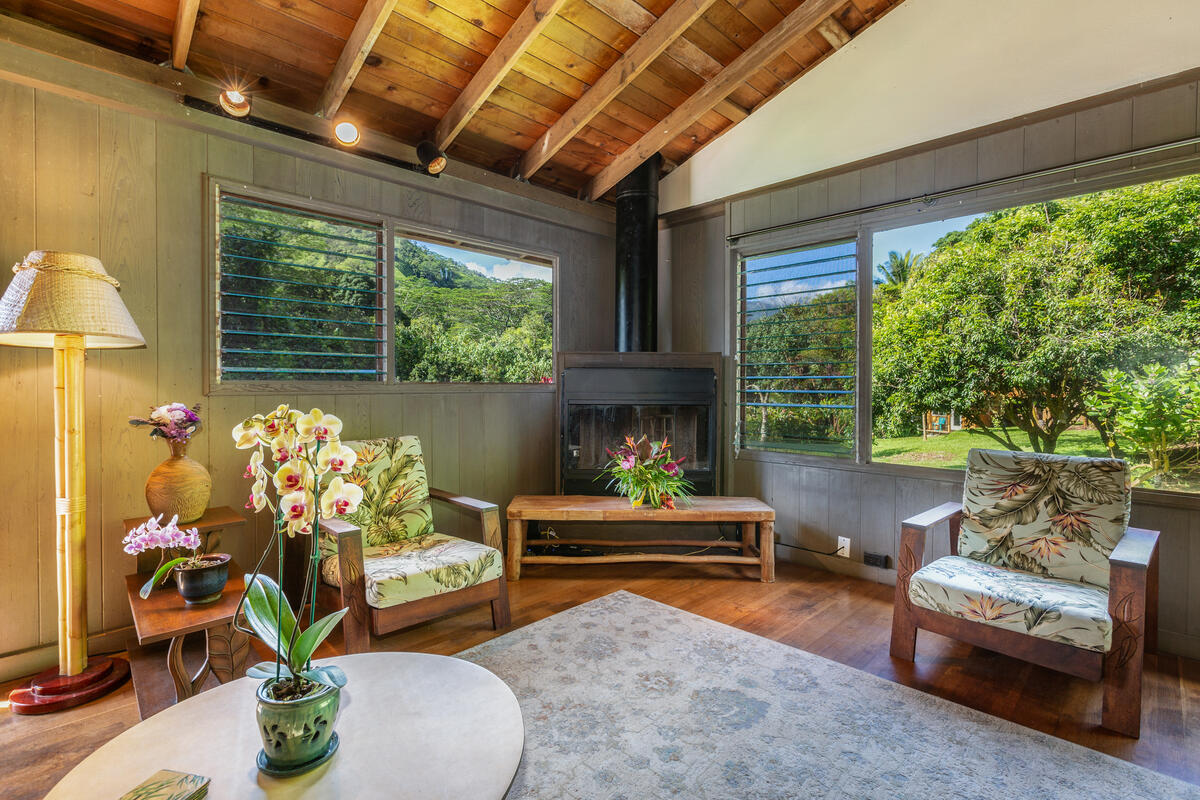 4867 Wainiha Powerhouse Road Hanalei, HI 96714 - Photo 6 of 26 a living room with patio furniture and a potted plants