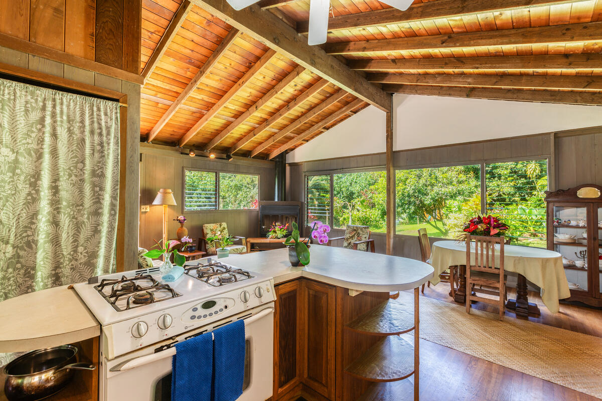 4867 Wainiha Powerhouse Road Hanalei, HI 96714 - Photo 8 of 26 a view of a dining room with furniture window and outside view