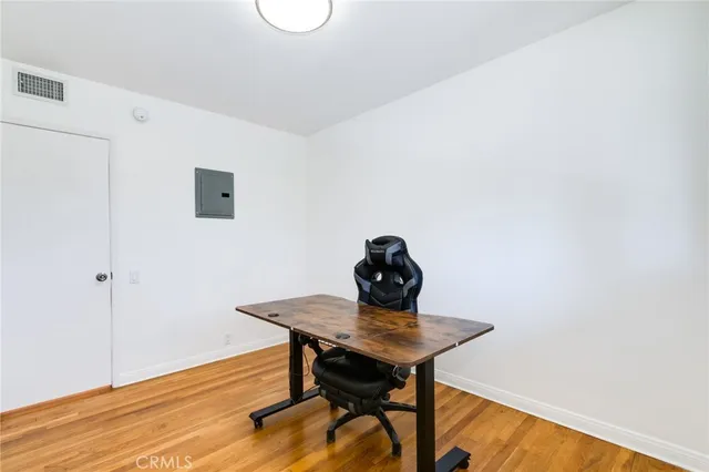 a view of a workspace with furniture