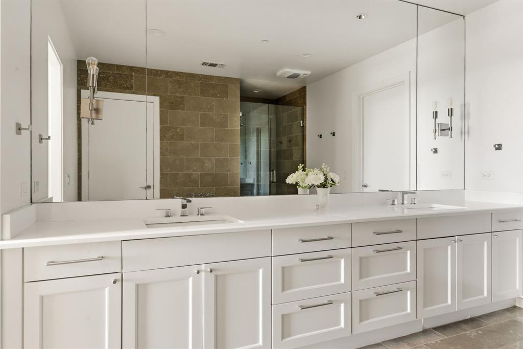 5656 North Central Expressway, Unit 801 Dallas, TX 75206 - Photo 14 of 26 a bathroom with a sink and a mirror