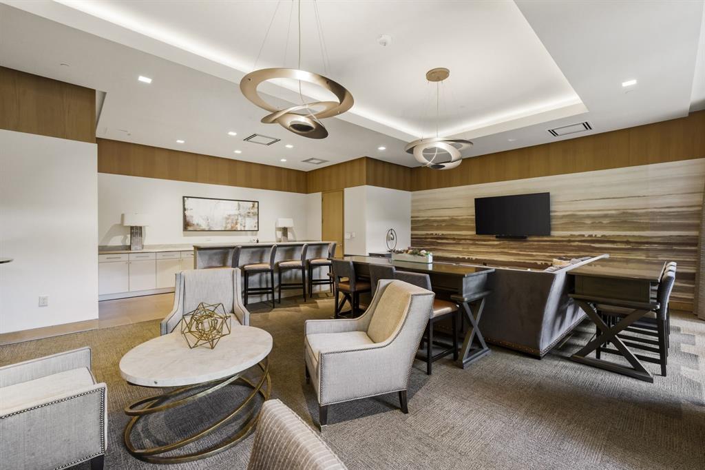 5656 North Central Expressway, Unit 801 Dallas, TX 75206 - Photo 23 of 26 a living room with furniture and a flat screen tv