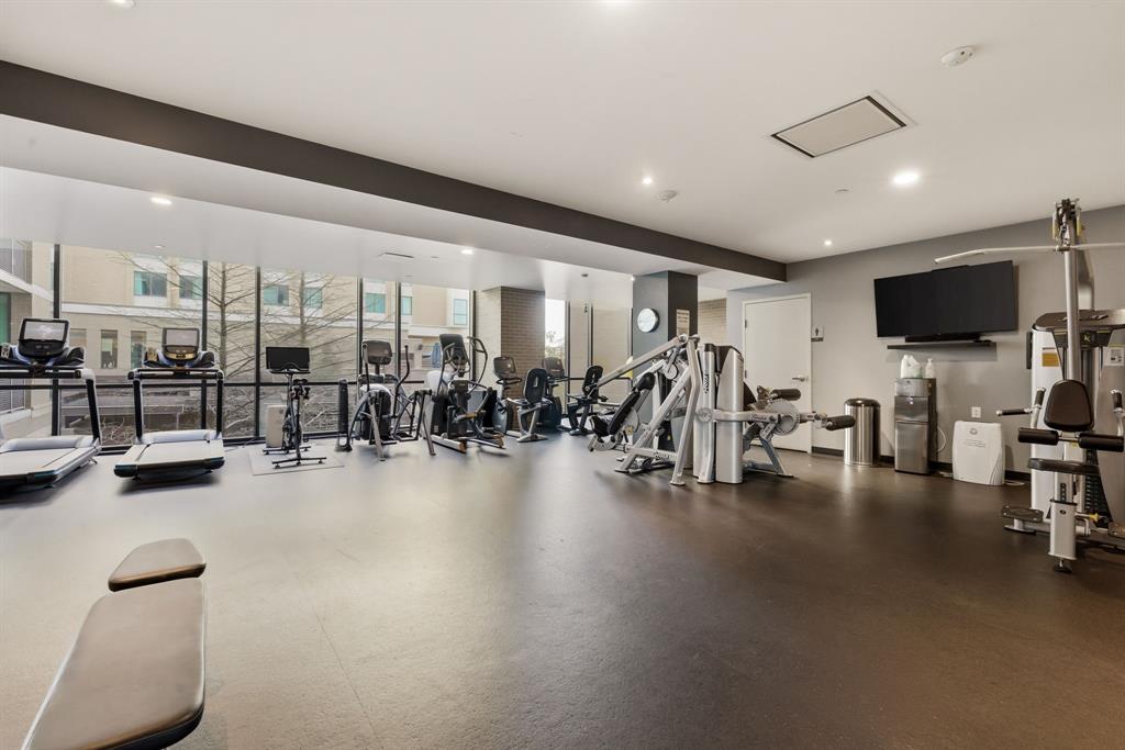 5656 North Central Expressway, Unit 801 Dallas, TX 75206 - Photo 24 of 26 a view of a room with gym equipment and large windows