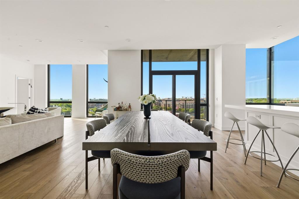 5656 North Central Expressway, Unit 801 Dallas, TX 75206 - Photo 5 of 26 a view of a dining room with furniture window and wooden floor