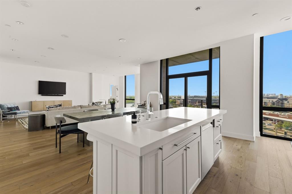 5656 North Central Expressway, Unit 801 Dallas, TX 75206 - Photo 8 of 26 a open kitchen with a sink and cabinets