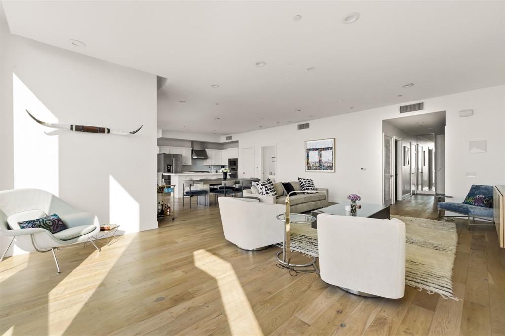 5656 North Central Expressway, Unit 801 Dallas, TX 75206 - Photo 9 of 26 a living room with furniture and a wooden floor