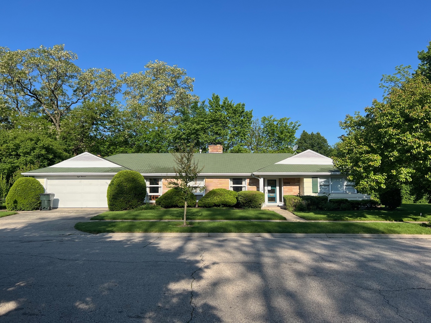 800 Windsor Road Glenview, IL 60025 - Photo 1 of 1 a front view of a house with a yard and garage
