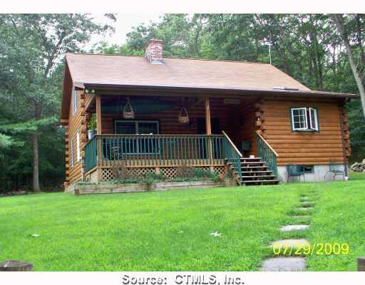19 Smith Road Plainfield, CT 06354 - Photo 1 of 1 a front view of a house with a yard
