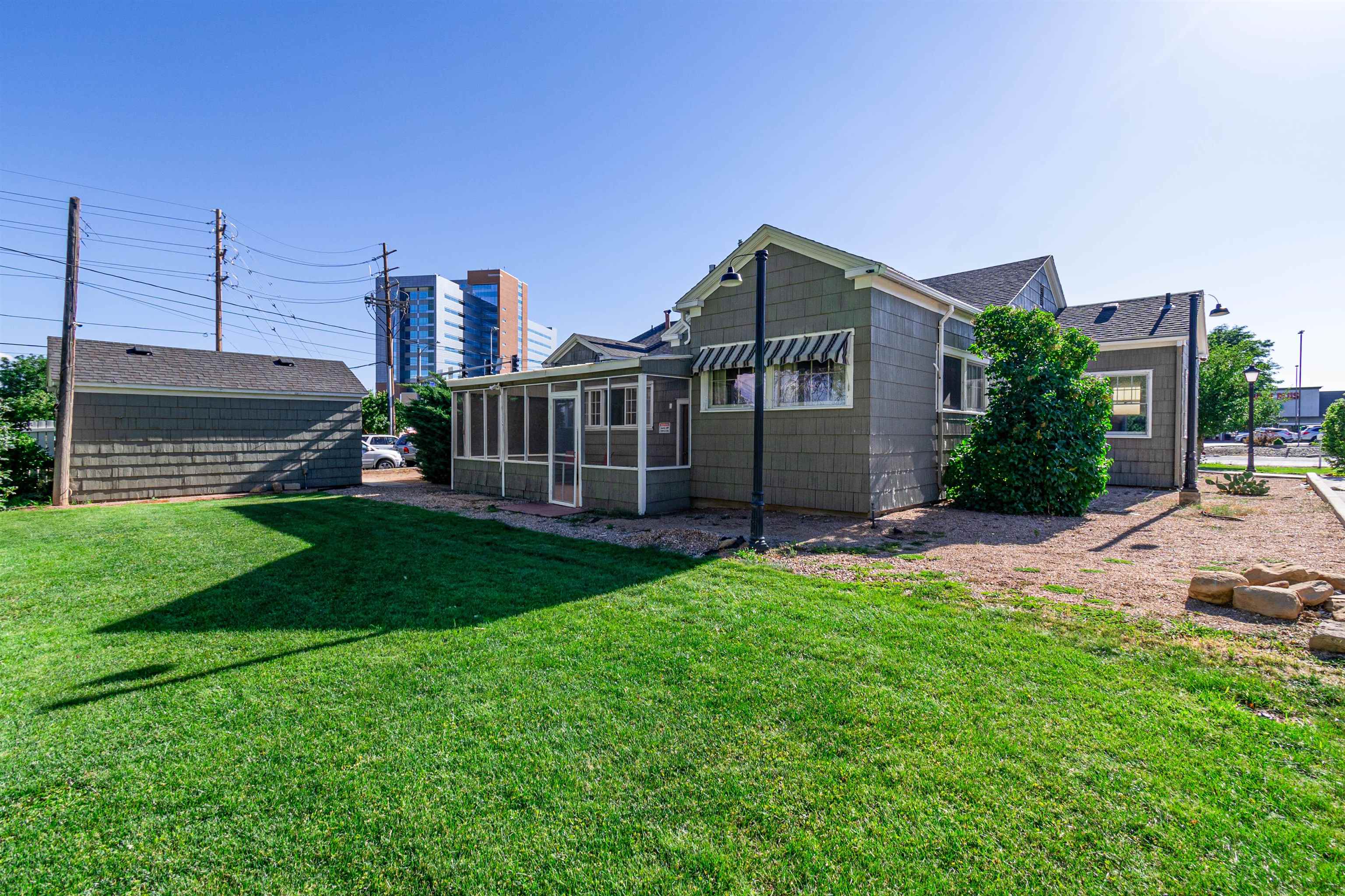 602-26 26 1/2 Road Grand Junction, CO 81506 - Photo 1 of 26 a front view of a house with a garden and plants