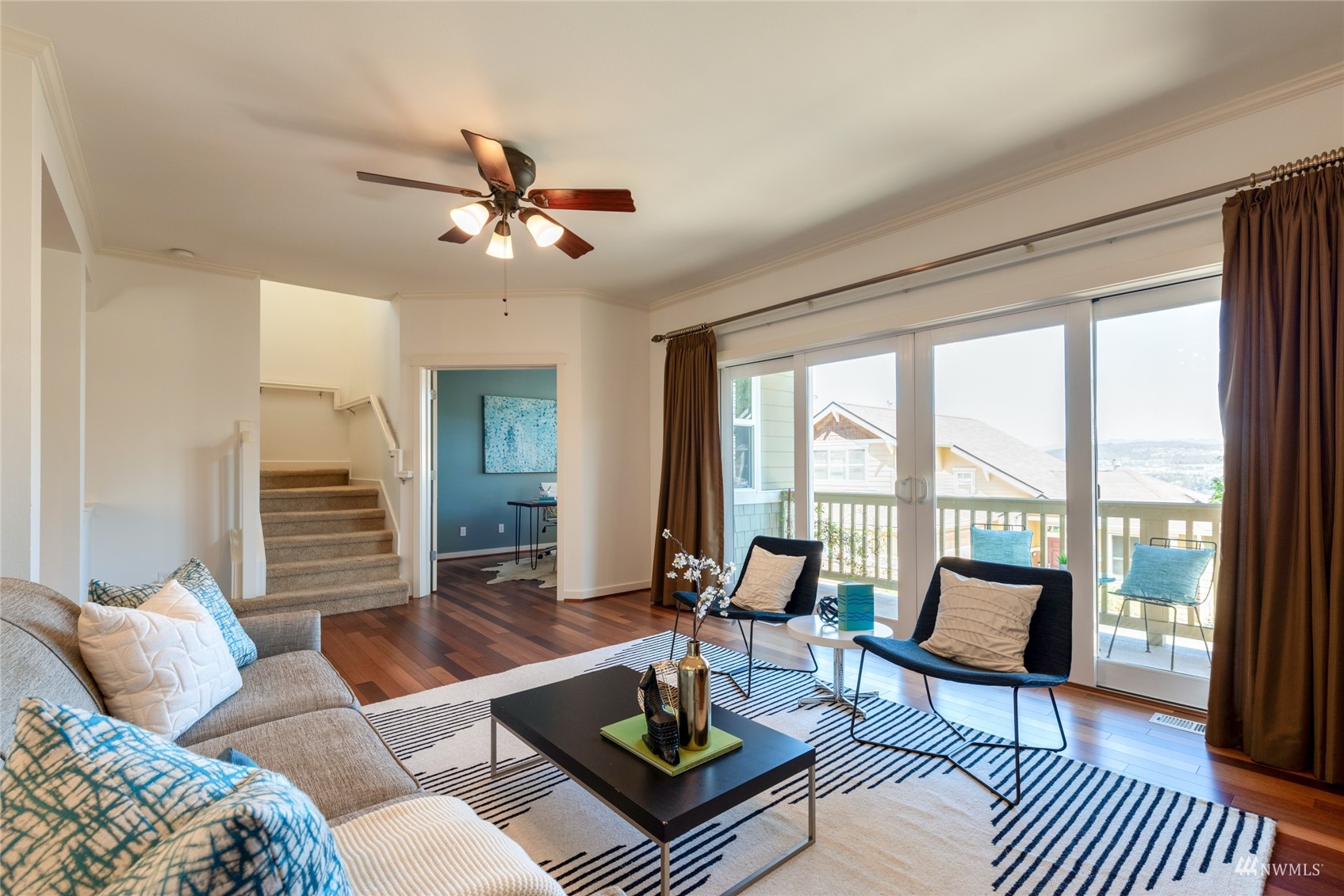 569 Alpine Ridge Place Northwest Issaquah, WA 98027 - Photo 5 of 35 a living room with furniture and a large window