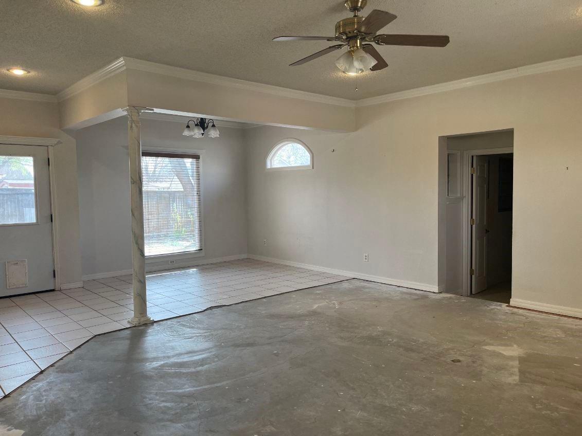 5527 94th Street Lubbock, TX 79424 - Photo 9 of 56 5527 94th living room with dining